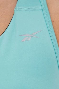 Γυναικεία Αθλητικά σουτιέν Αθλητικό σουτιέν Reebok Essentials χρώμα: τιρκουάζ 9 Γυναικεία Αθλητικά σουτιέν Αθλητικό σουτιέν Reebok Essentials χρώμα: τιρκουάζ -Reebok Εκπτώσεις unnamed file 1117