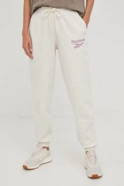 Γυναικεία Παντελόνια φόρμας Παντελόνι φόρμας Reebok Identity , χρώμα: μπεζ