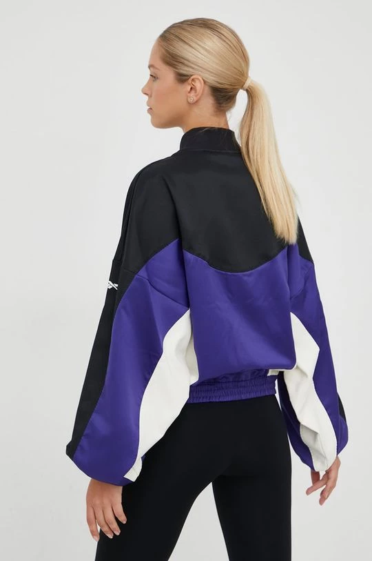 Γυναικεία Κοντά μπουφάν Σακάκι προπόνησης Reebok Tech Style μοβ 3 Γυναικεία Κοντά μπουφάν Σακάκι προπόνησης Reebok Tech Style μοβ - Image 3