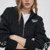 Γυναικεία Με φερμουάρ Μπλούζα Reebok χρώμα: μαύρο