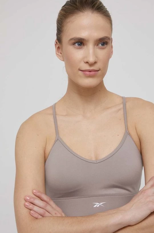 Γυναικεία Αθλητικά σουτιέν Αθλητικό σουτιέν Reebok μπεζ 1 Γυναικεία Αθλητικά σουτιέν Αθλητικό σουτιέν Reebok μπεζ